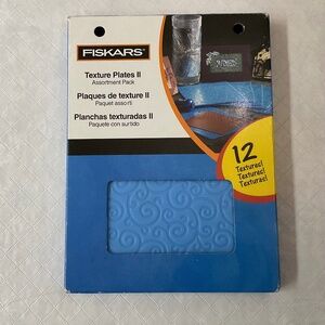 Fiskars Assortment Pack - Texture Plates II contains 6 double-sided plates
